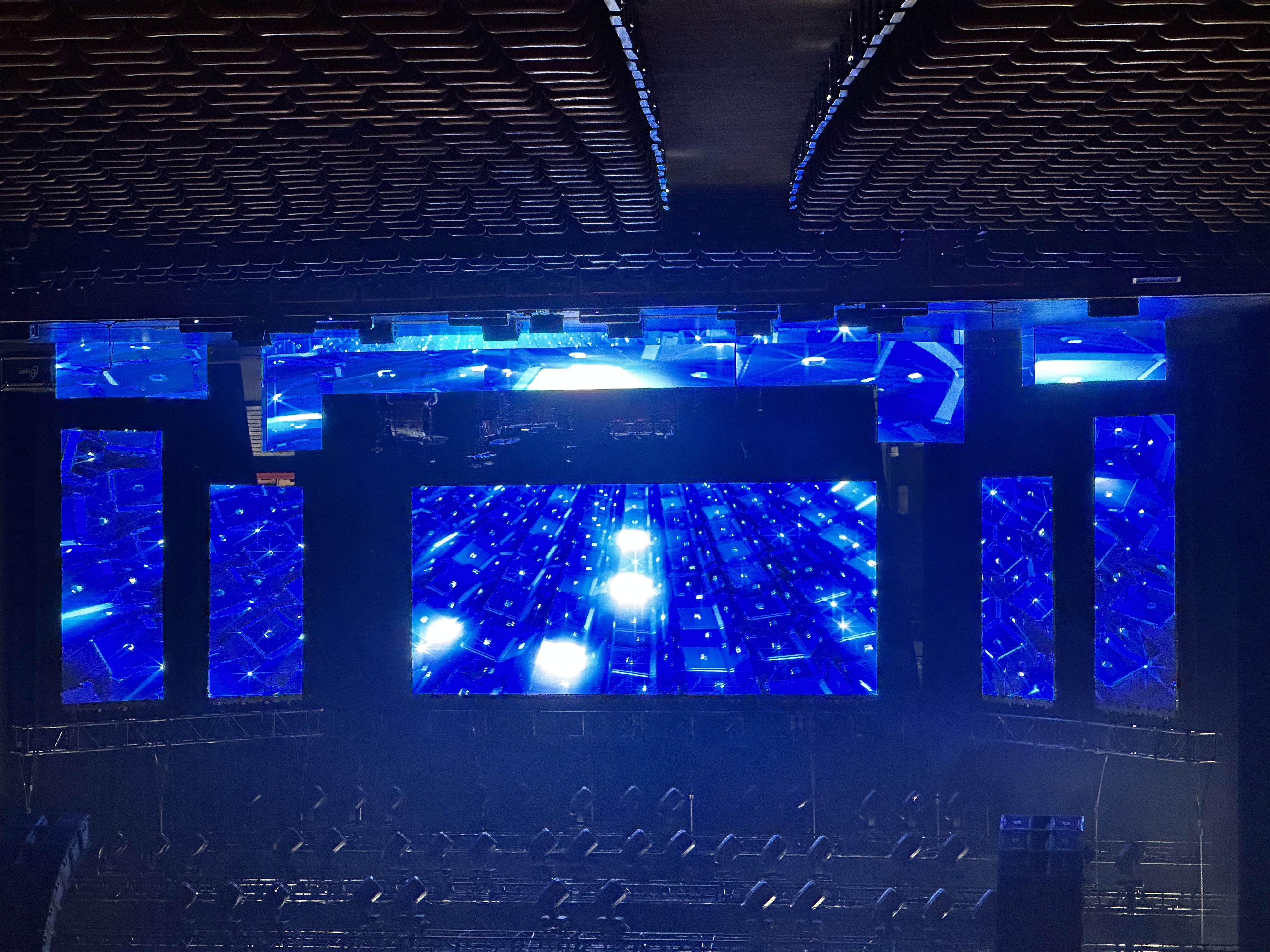 Arena stage with large blue LED wall design
